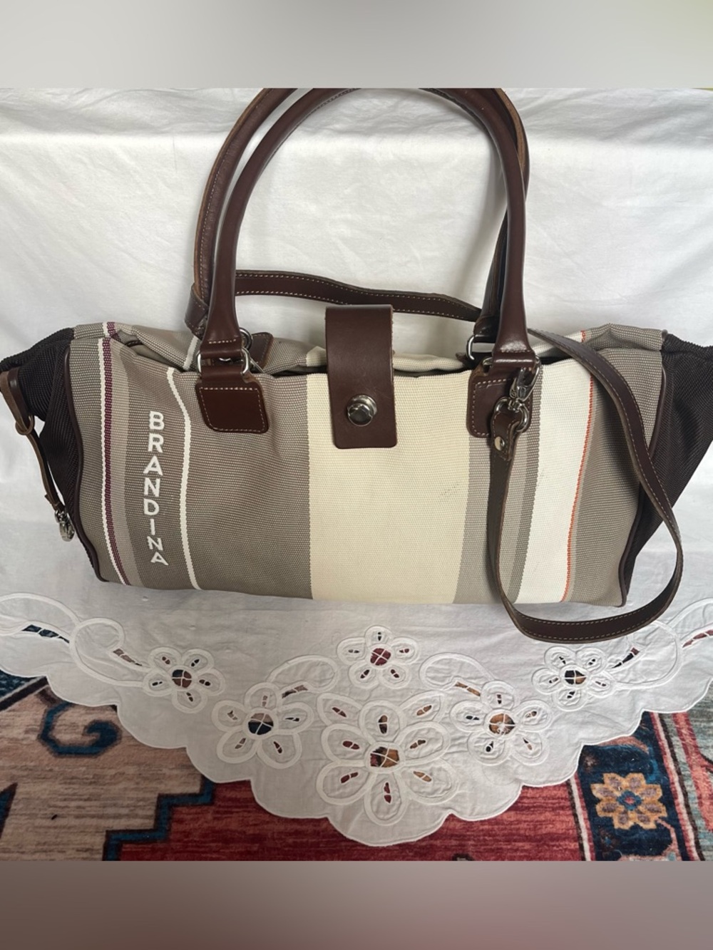 Brandina striped canvas handbag with leather accents